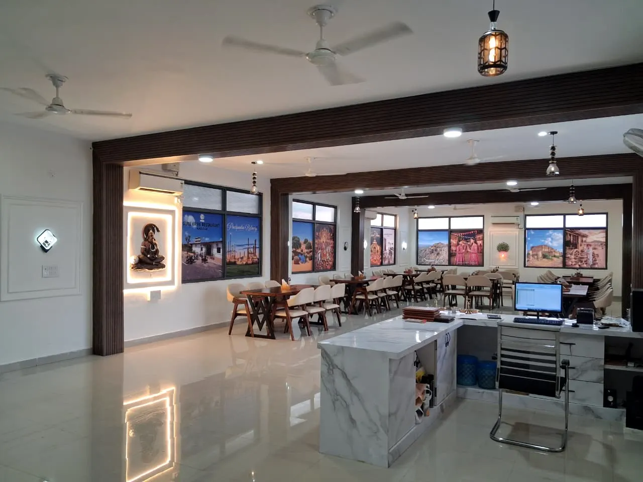 Marble billing counter and dining hall at Guru Kripa pure veg restaurant
